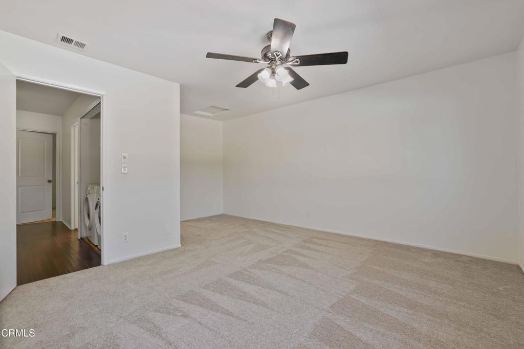 3183 Kelp Lane Oxnard, CA 93035 - Photo 13 of 23 a view of a room with a ceiling fan and closet
