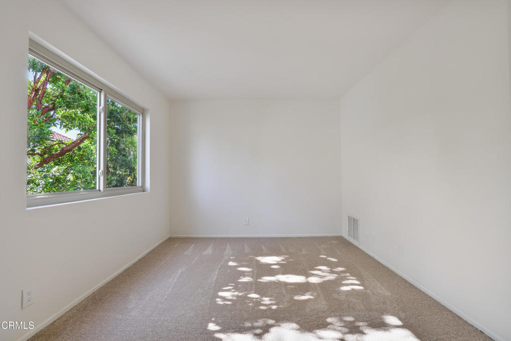 3183 Kelp Lane Oxnard, CA 93035 - Photo 19 of 23 a view of an empty room with a window