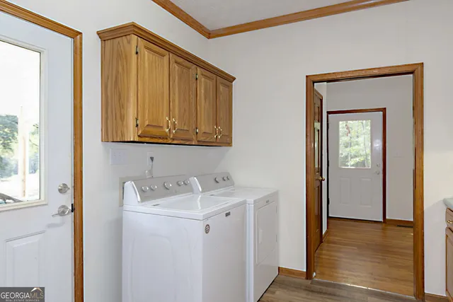 a kitchen with sink and cabinets