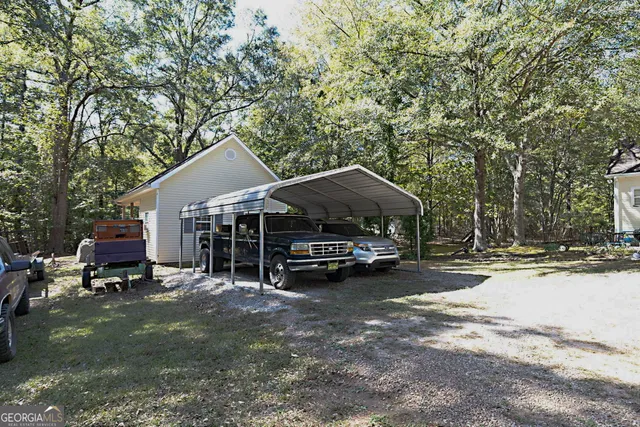 a view of a car parked in front of a house