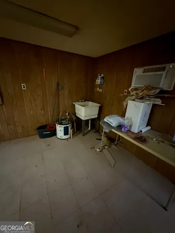 a view of outdoor space with deck and trees