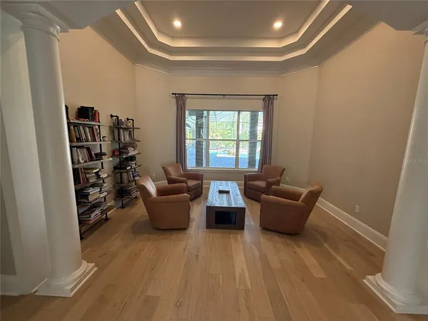 a living room with furniture and a window