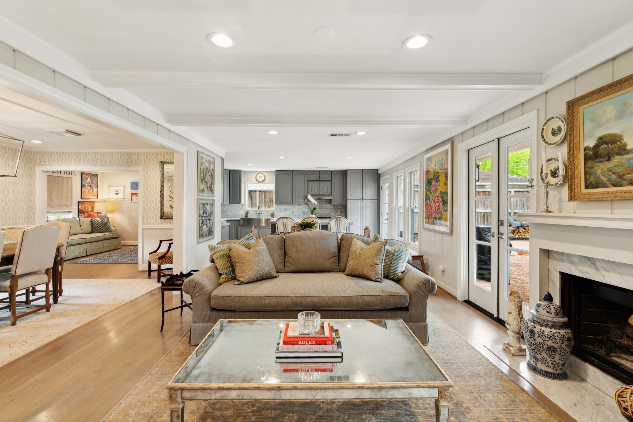 6158 Burgoyne Road Houston, TX 77057 - Photo 17 of 37 a living room with furniture a large window and a fireplace