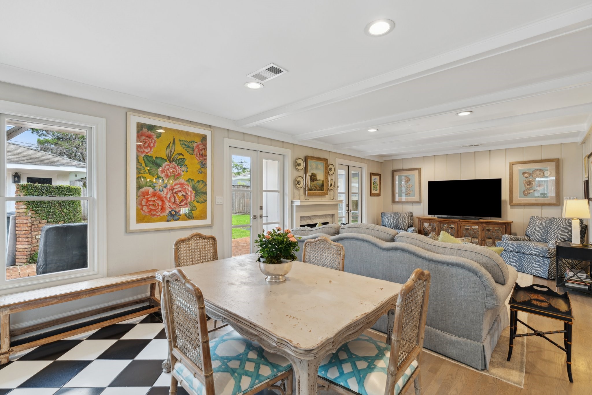 6158 Burgoyne Road Houston, TX 77057 - Photo 20 of 37 a view of a dining room with furniture window and wooden floor