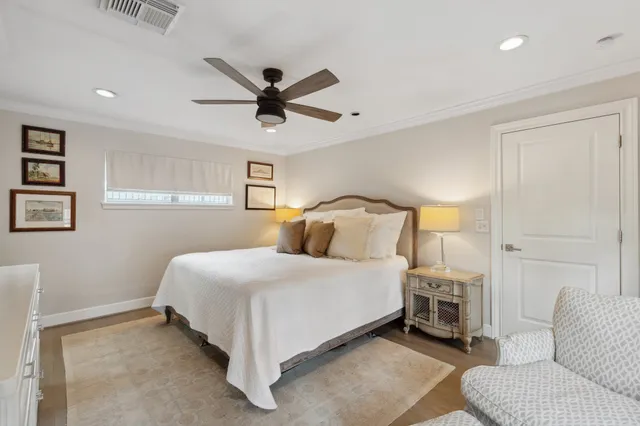 a bathroom with a granite countertop sink a large mirror and a shower