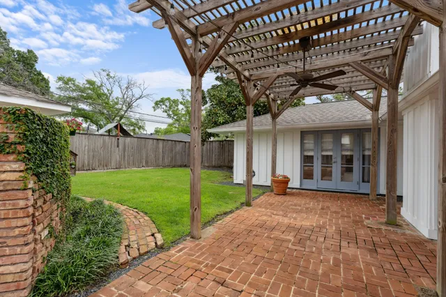 a backyard of a house with lots of green space