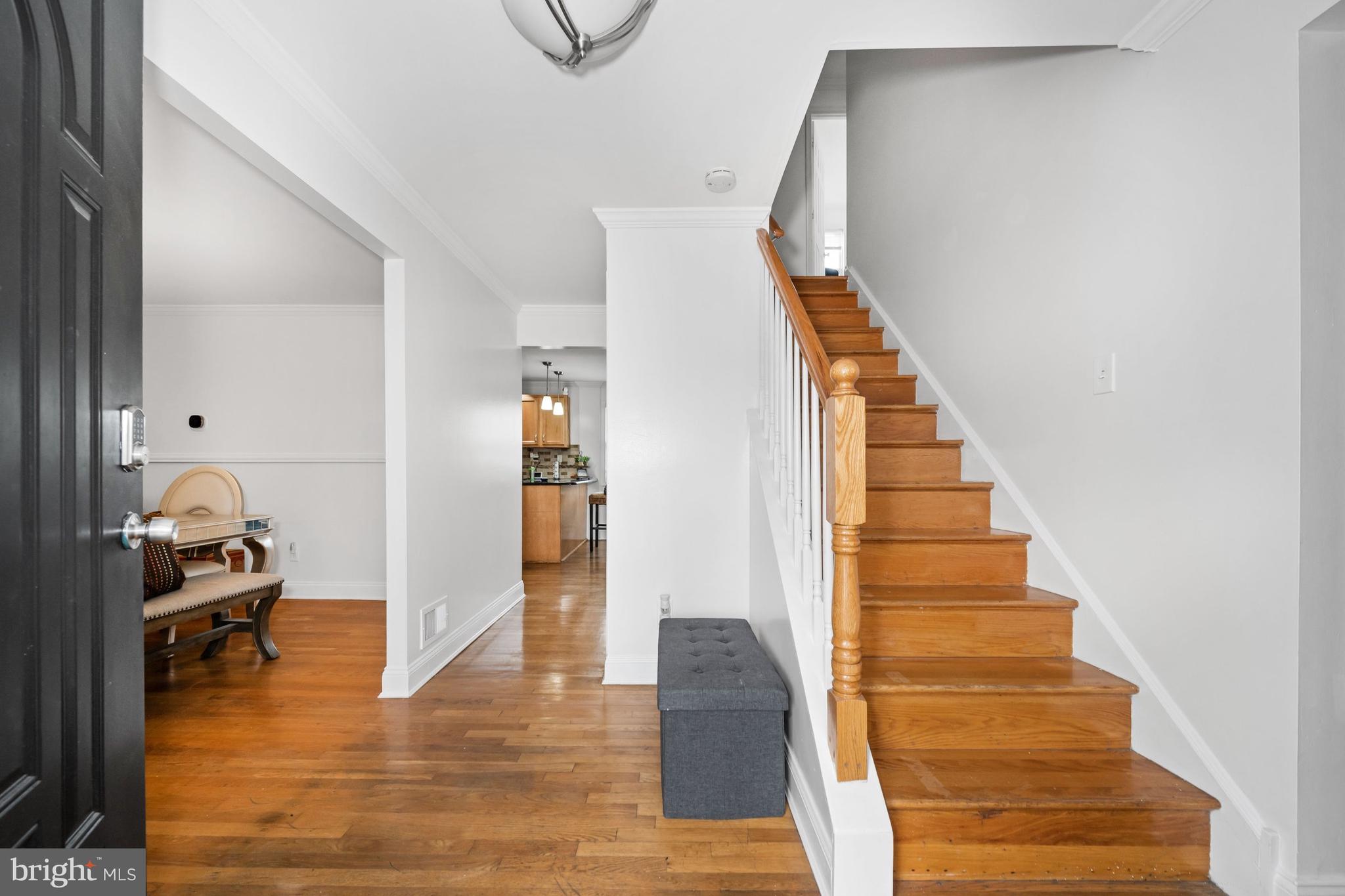 18 George Read Road New Castle, DE 19720 - Photo 9 of 40 a view of entryway and hall with wooden floor