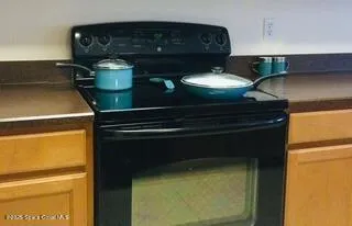 a close view of water heater and stove