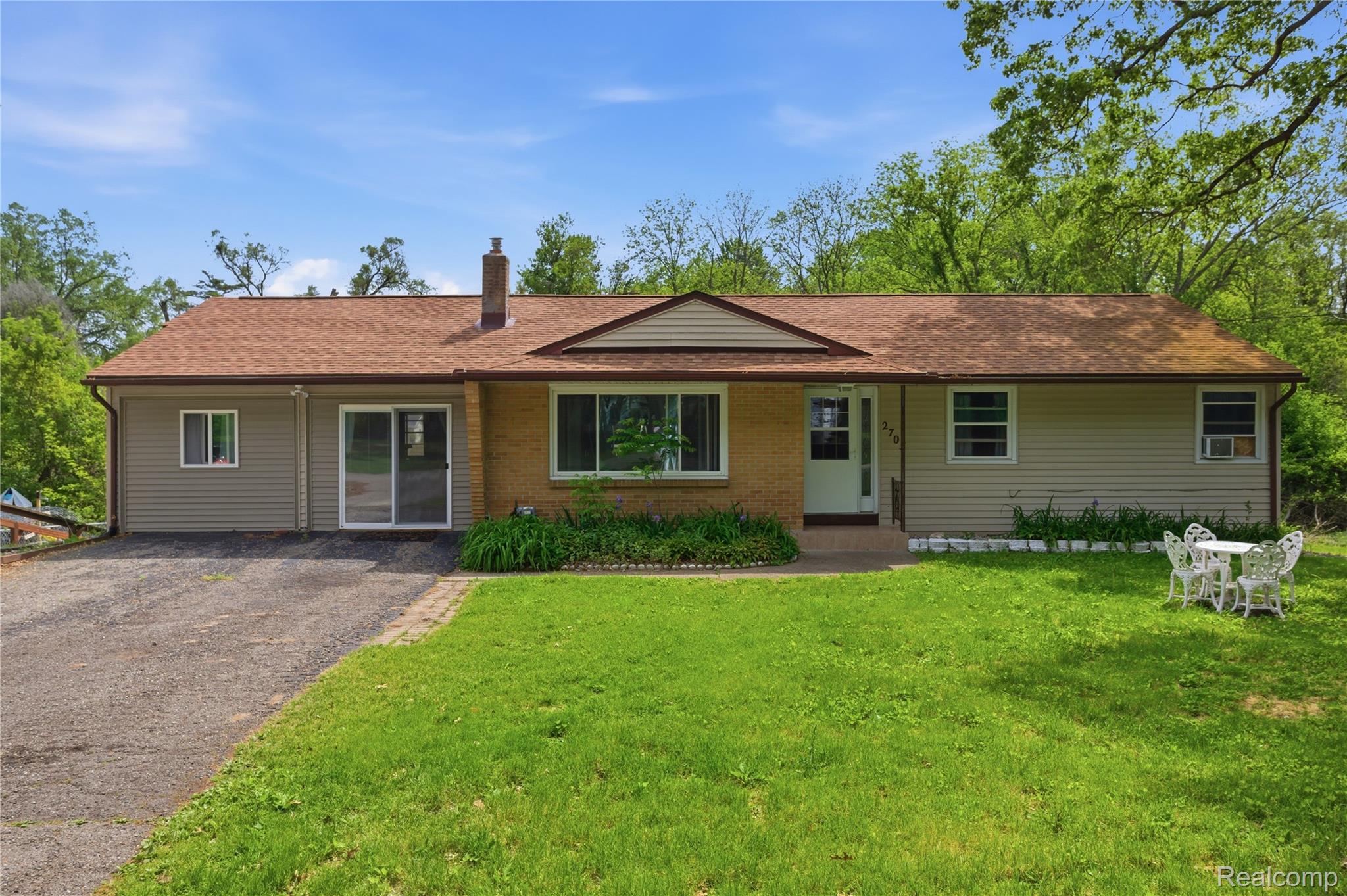 2705 Glendale Road Jackson, MI 49203 - Photo 1 of 57 Ranch-style residence featuring a combination brick and siding facade