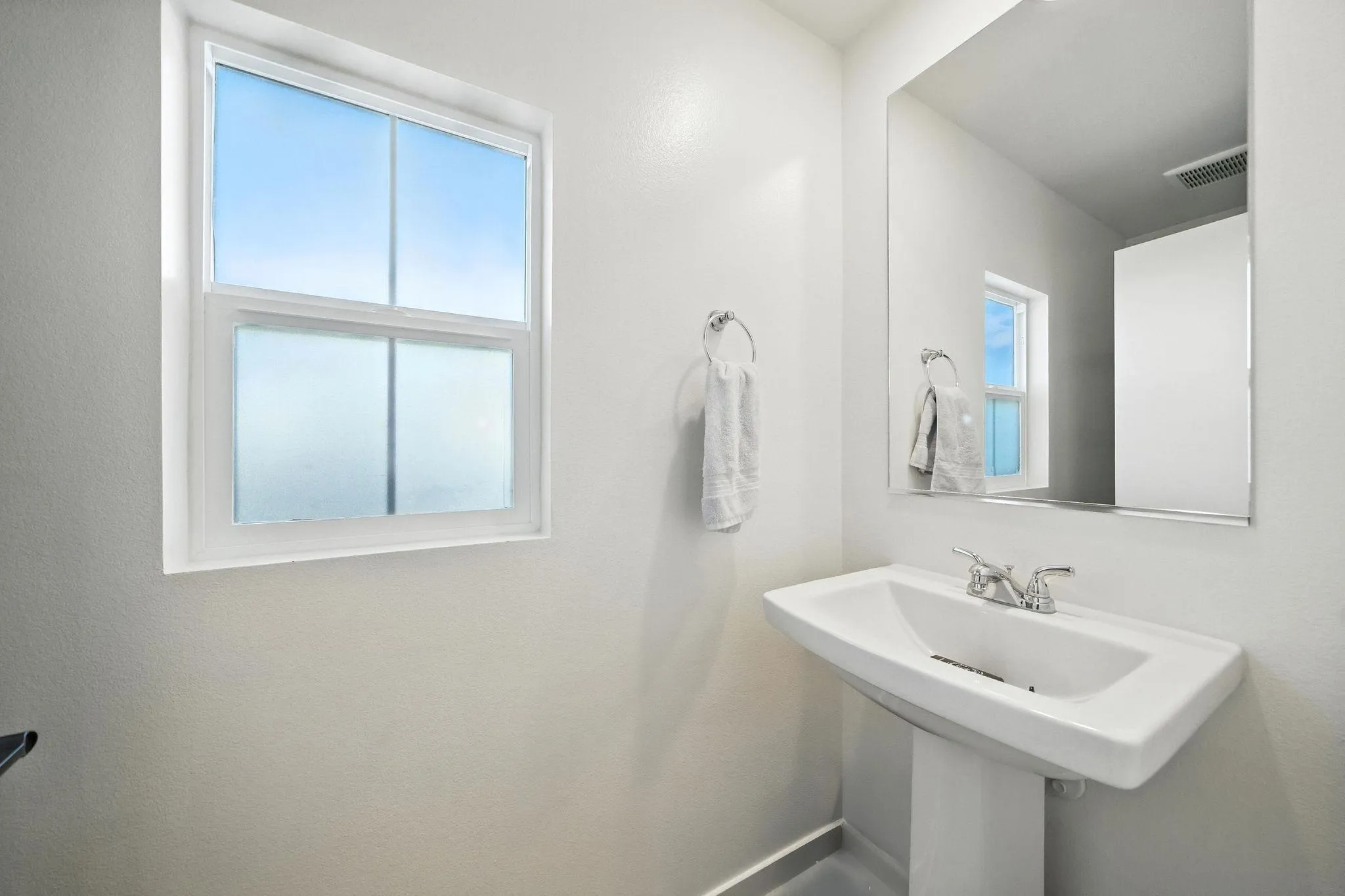 239 Blended Place Fallbrook, CA 92028 - Photo 20 of 64 a bathroom with a sink and a mirror