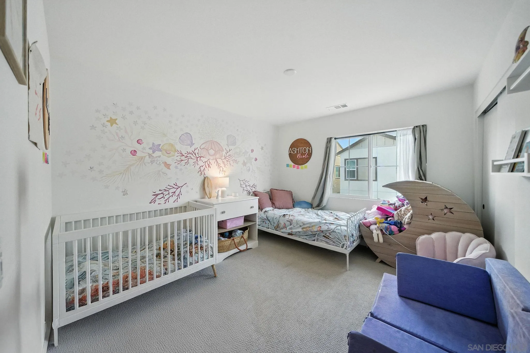 239 Blended Place Fallbrook, CA 92028 - Photo 28 of 64 a bedroom with furniture and baby crib