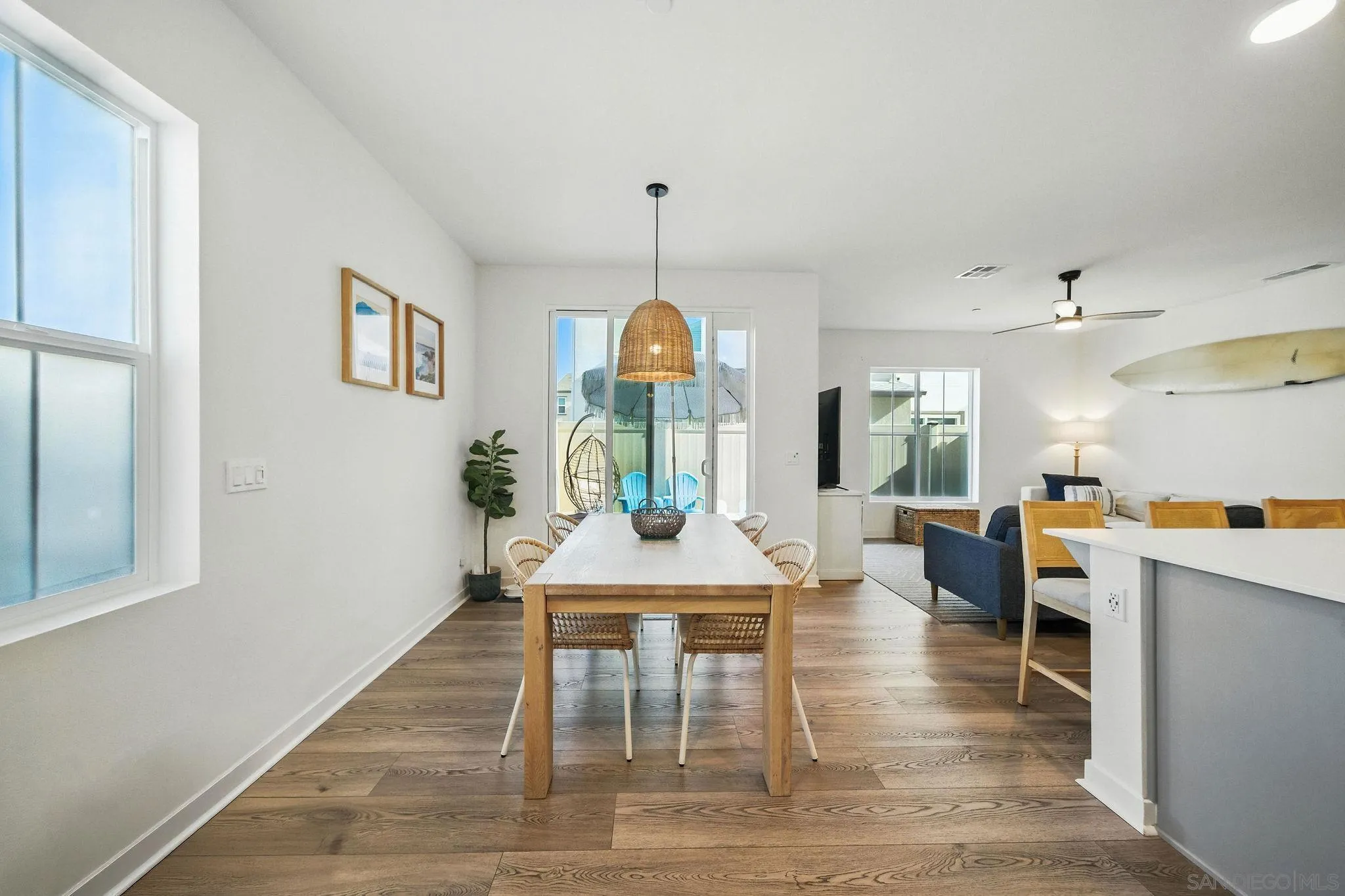 239 Blended Place Fallbrook, CA 92028 - Photo 3 of 64 a view of a dining room with furniture window and wooden floor