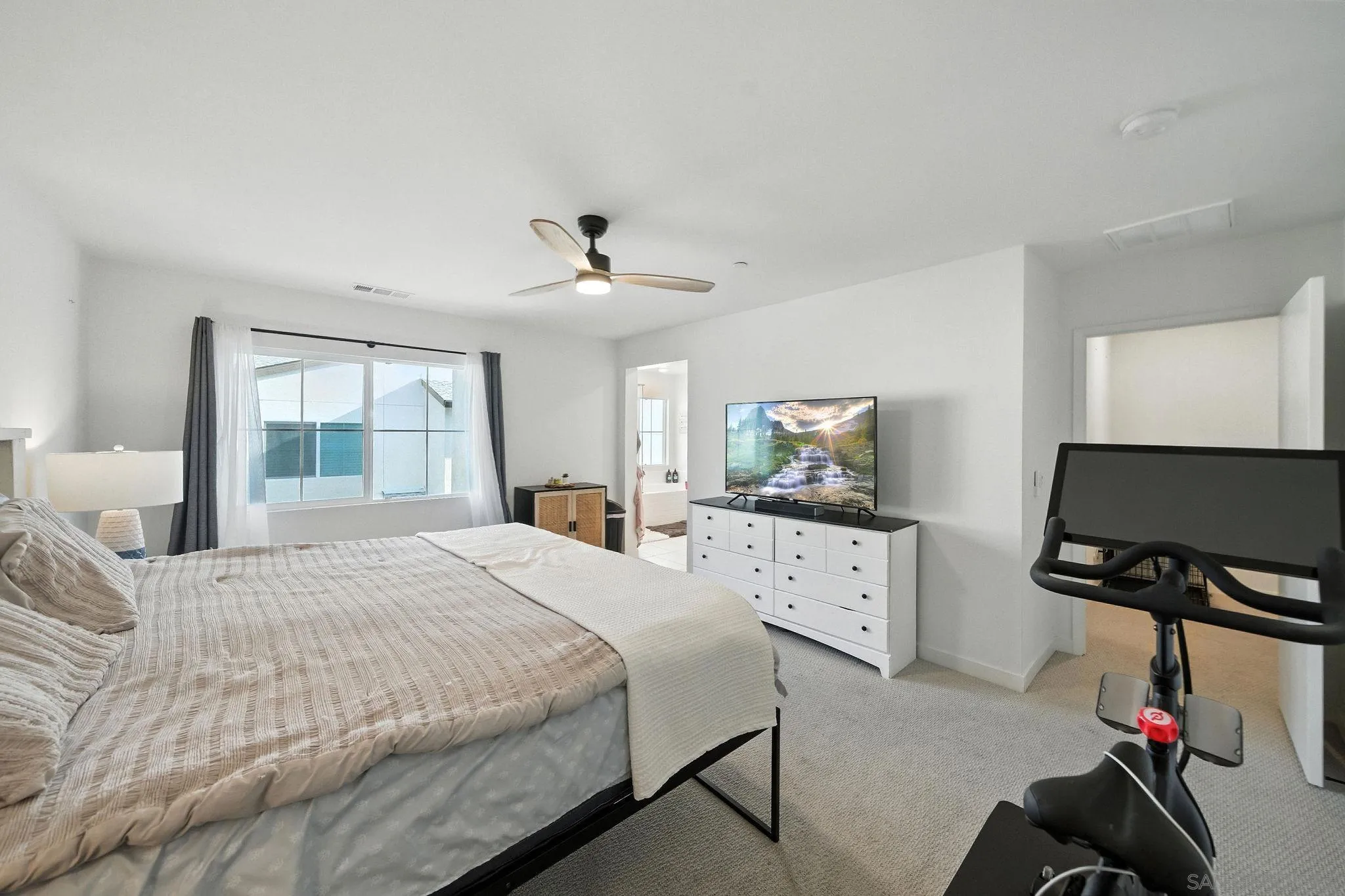 239 Blended Place Fallbrook, CA 92028 - Photo 35 of 64 a bedroom with a bed and a flat screen tv