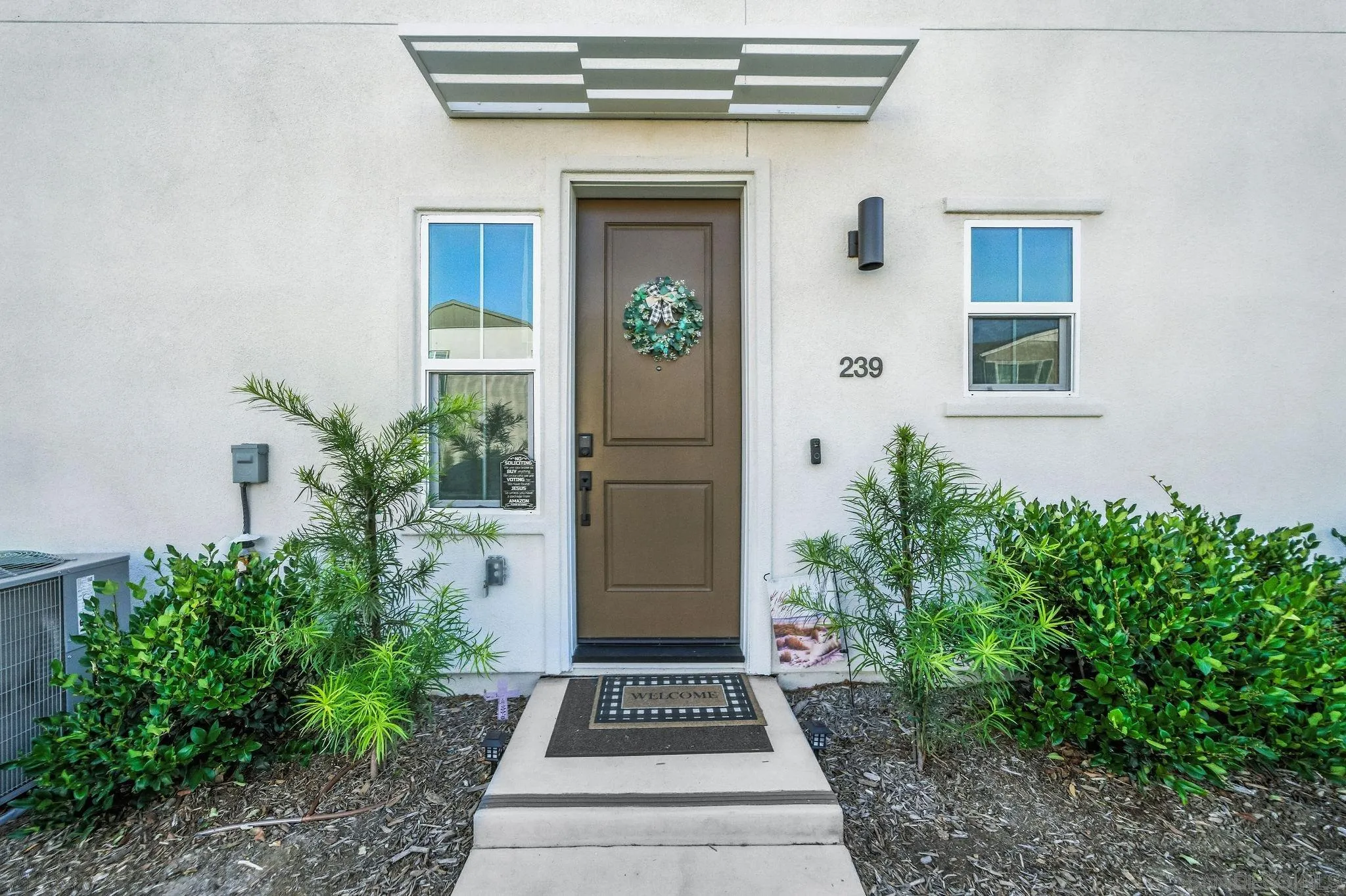 239 Blended Place Fallbrook, CA 92028 - Photo 42 of 64 a front view of a house with a yard