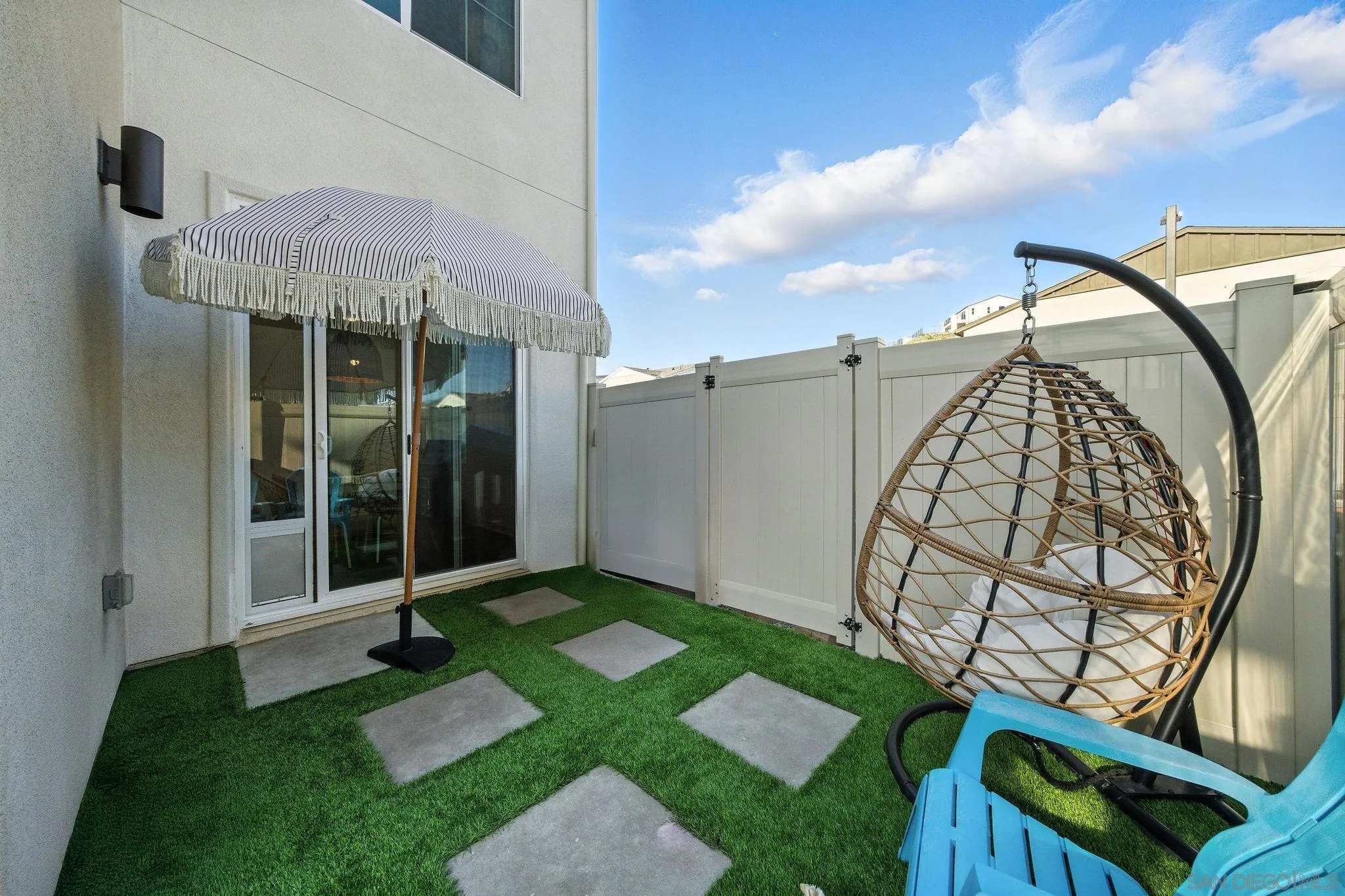 239 Blended Place Fallbrook, CA 92028 - Photo 44 of 64 a view of a chair and table in backyard