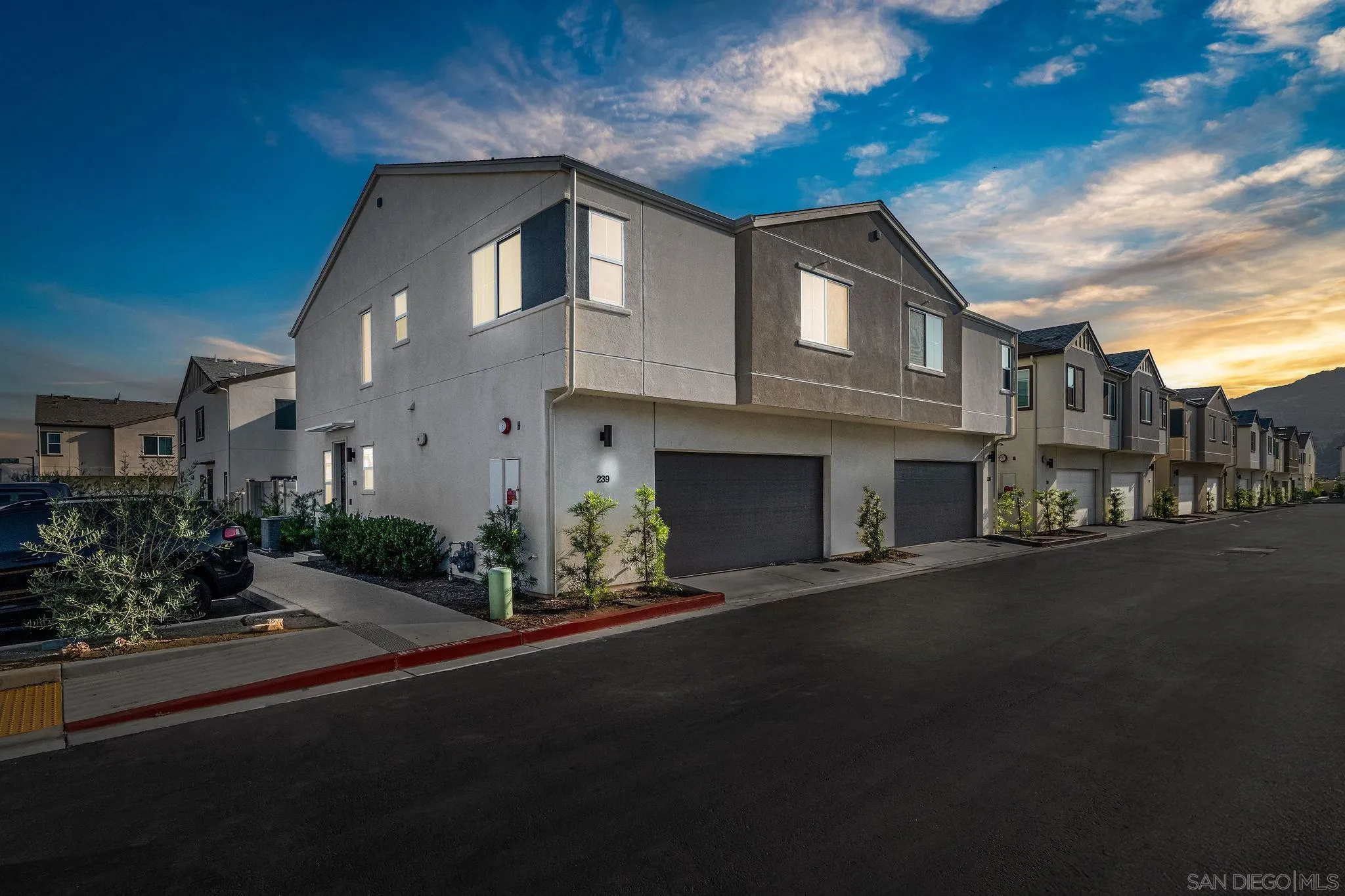 239 Blended Place Fallbrook, CA 92028 - Photo 51 of 64 a front view of a house with a garden