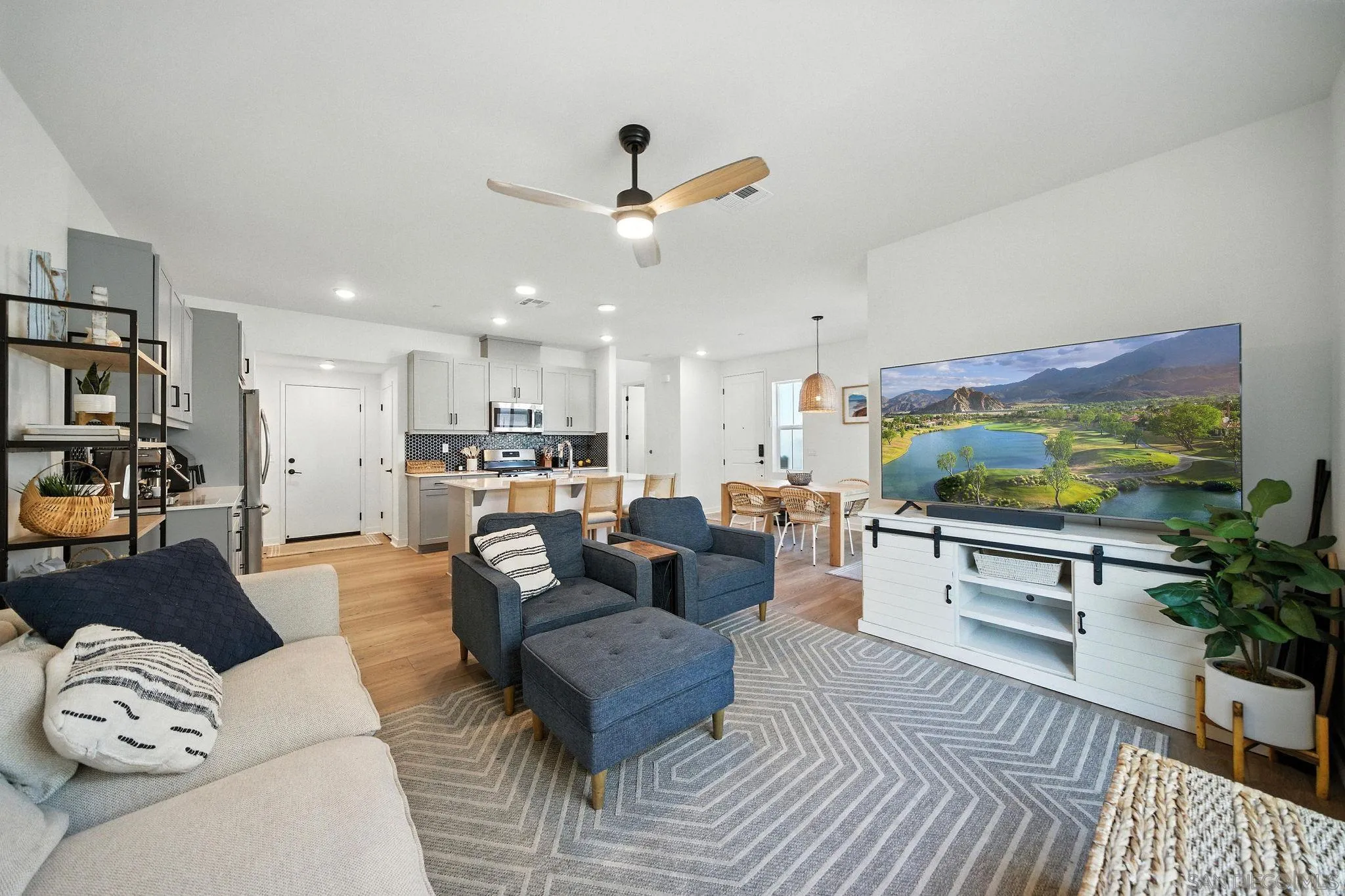 239 Blended Place Fallbrook, CA 92028 - Photo 7 of 64 a living room with furniture and a flat screen tv