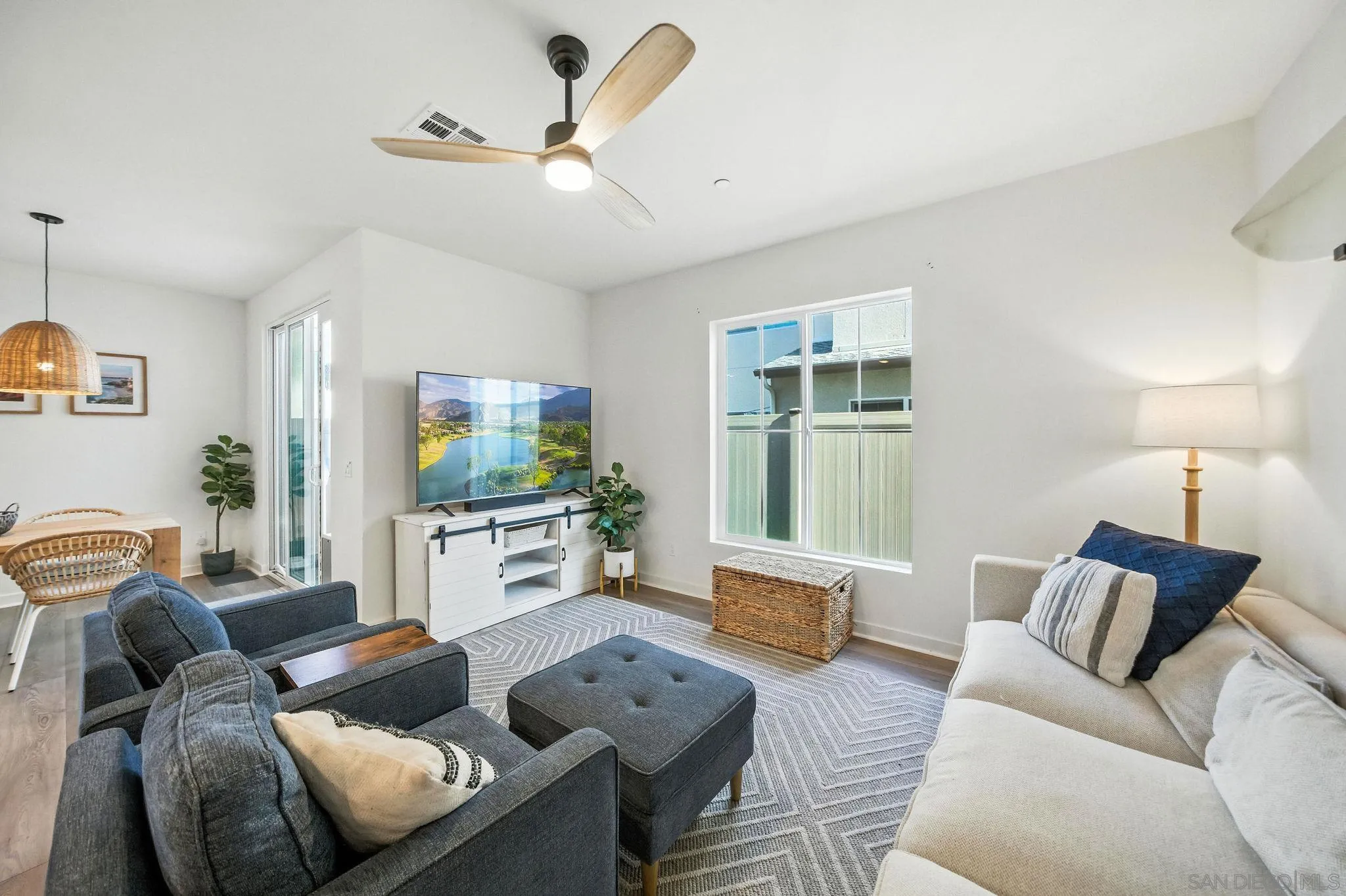 239 Blended Place Fallbrook, CA 92028 - Photo 9 of 64 a living room with furniture and a flat screen tv