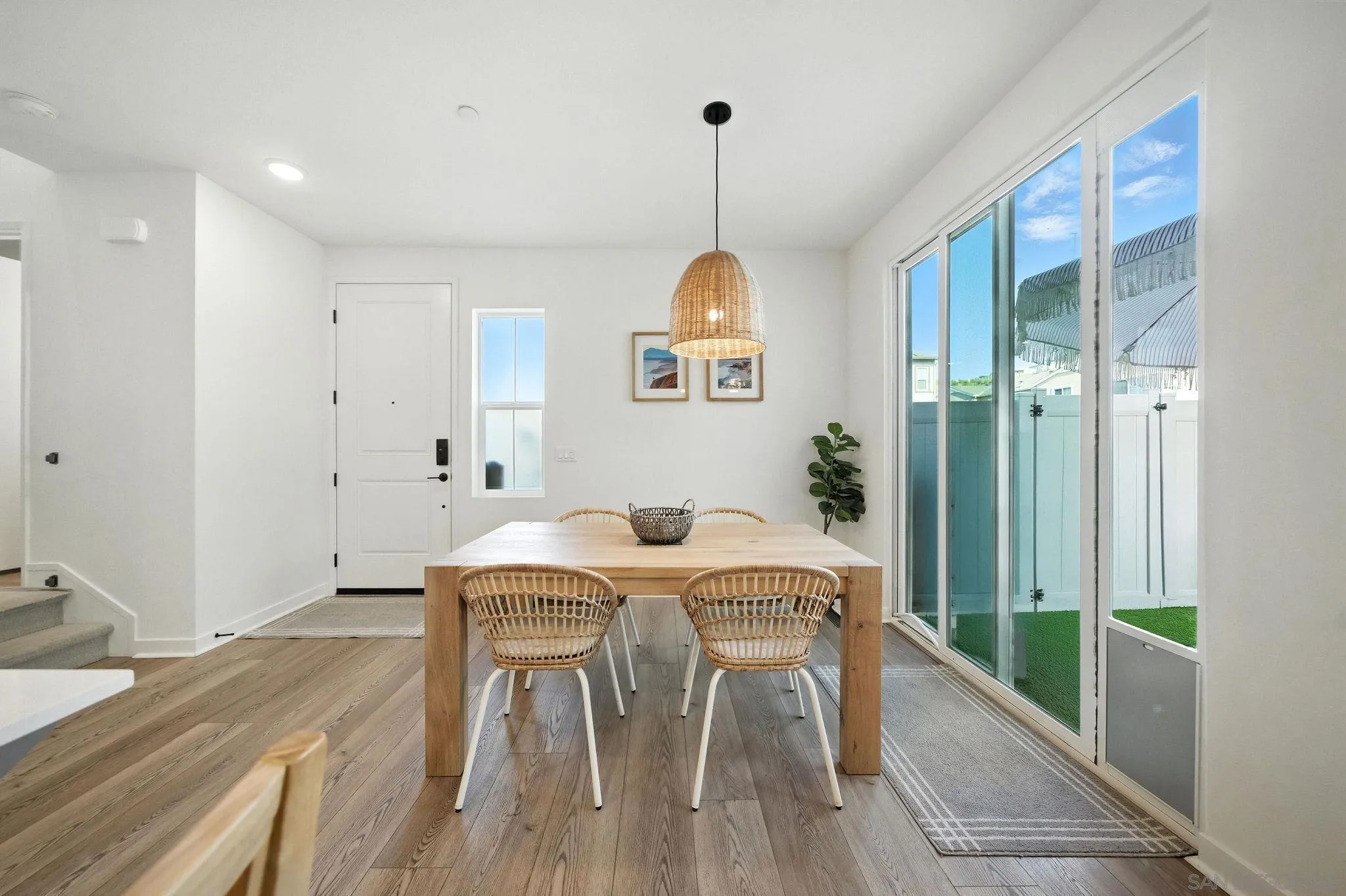 239 Blended Place Fallbrook, CA 92028 - Photo 10 of 64 a view of a dining room with furniture window and wooden floor