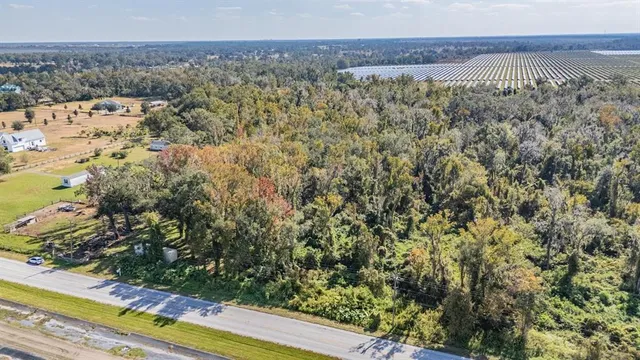 a view of a yard with an outdoor space