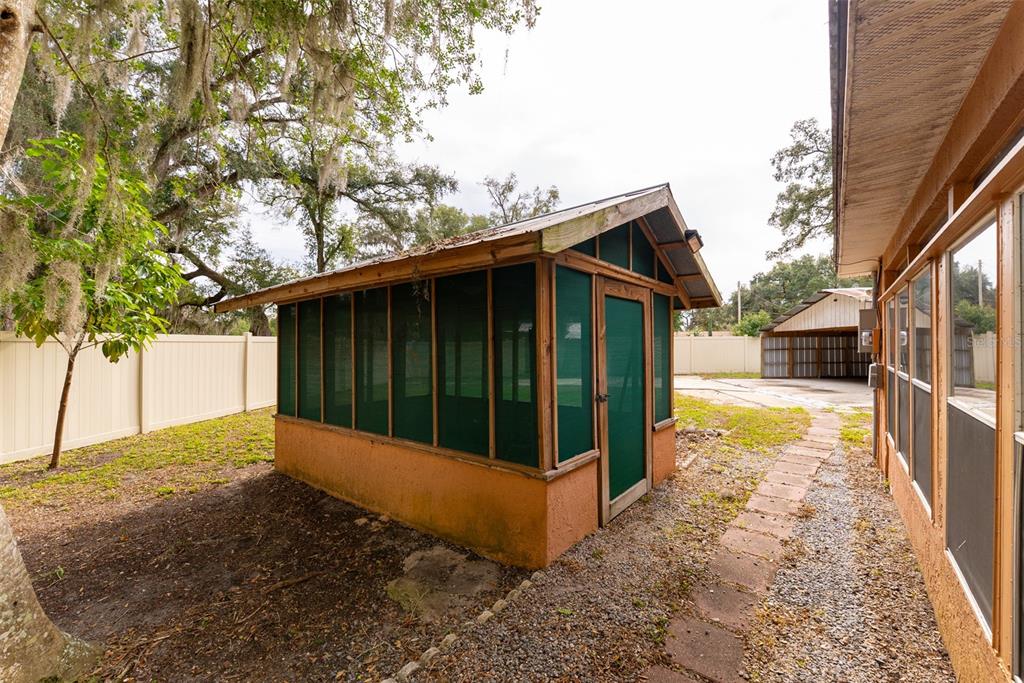 1860 Northeast 62nd Street Ocala, FL 34479 - Photo 34 of 64 a view of a house with a yard