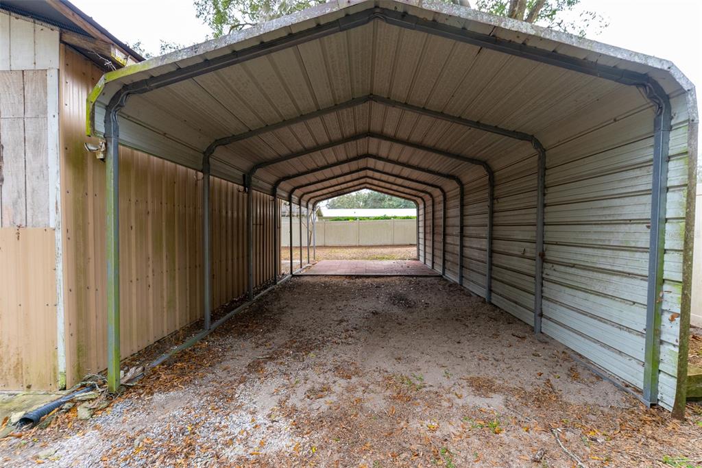 1860 Northeast 62nd Street Ocala, FL 34479 - Photo 45 of 64 a front view of a house with a yard