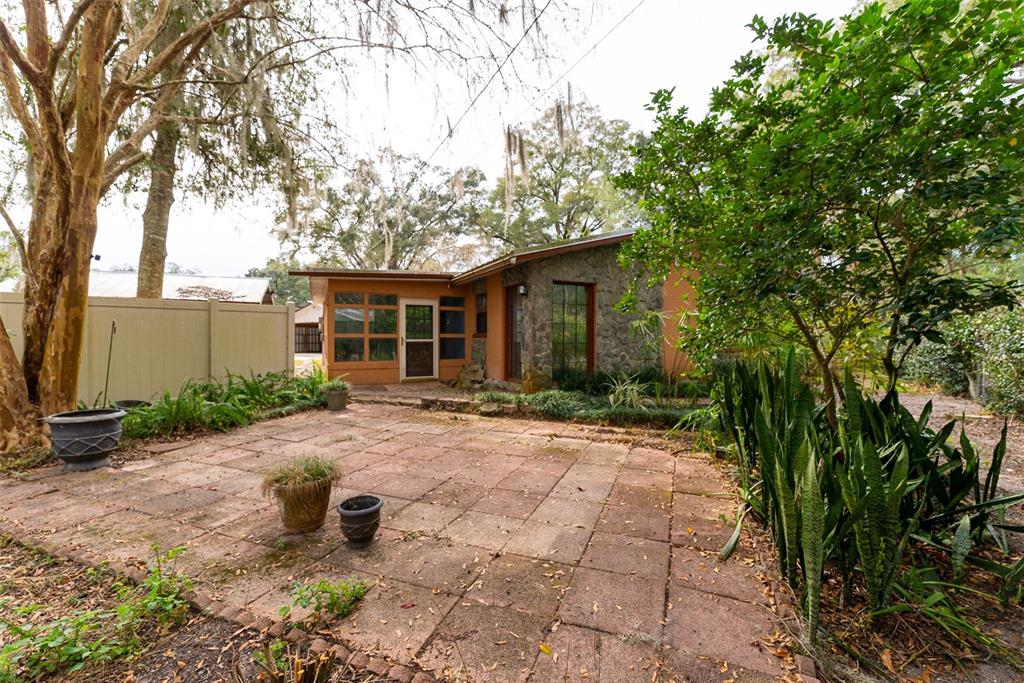 1860 Northeast 62nd Street Ocala, FL 34479 - Photo 47 of 64 a view of a house with yard and plants