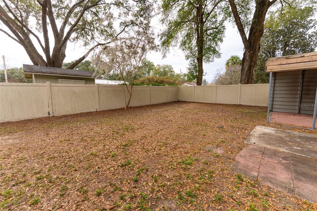 1860 Northeast 62nd Street Ocala, FL 34479 - Photo 55 of 64 a view of a backyard