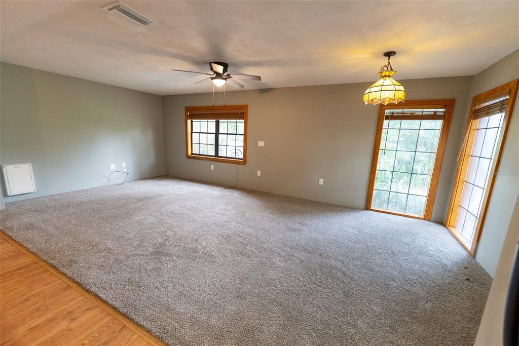 1860 Northeast 62nd Street Ocala, FL 34479 - Photo 8 of 64 a view of an empty room with a window