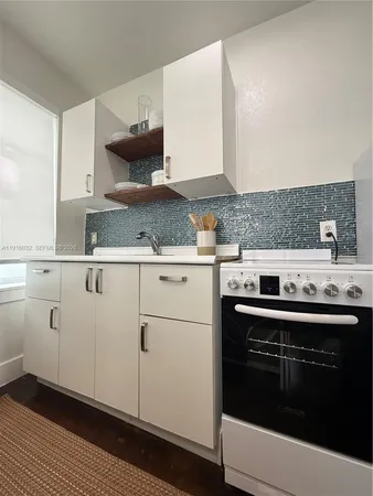 a bathroom with a toilet and a sink