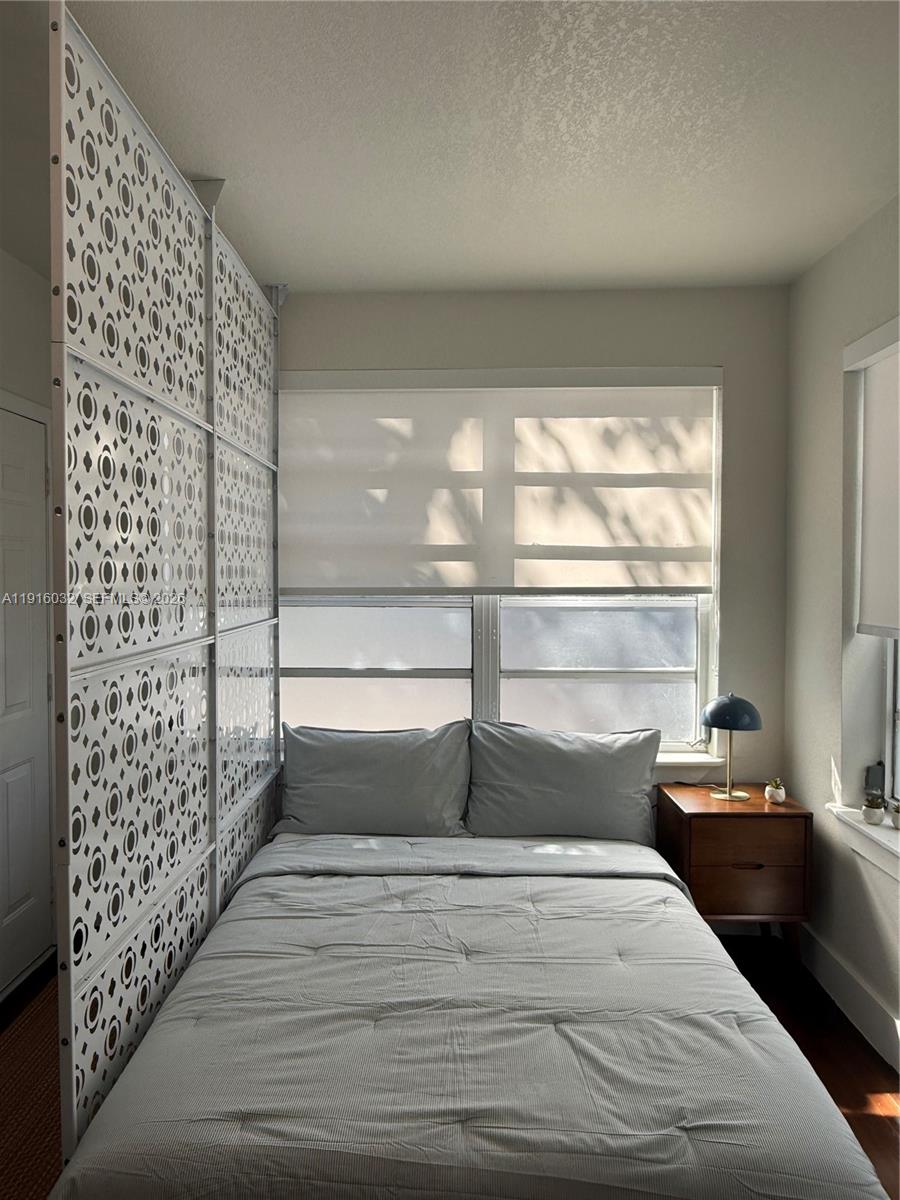 723 2nd Street, Unit 1 Miami Beach, FL 33139 - Photo 4 of 6 a bathroom with a bathtub and a shower