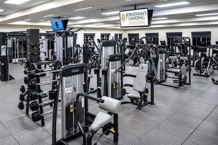 16913 Waterbend Drive, Unit 165 Jupiter, FL 33477 - Photo 37 of 39 a view of a room with gym equipment