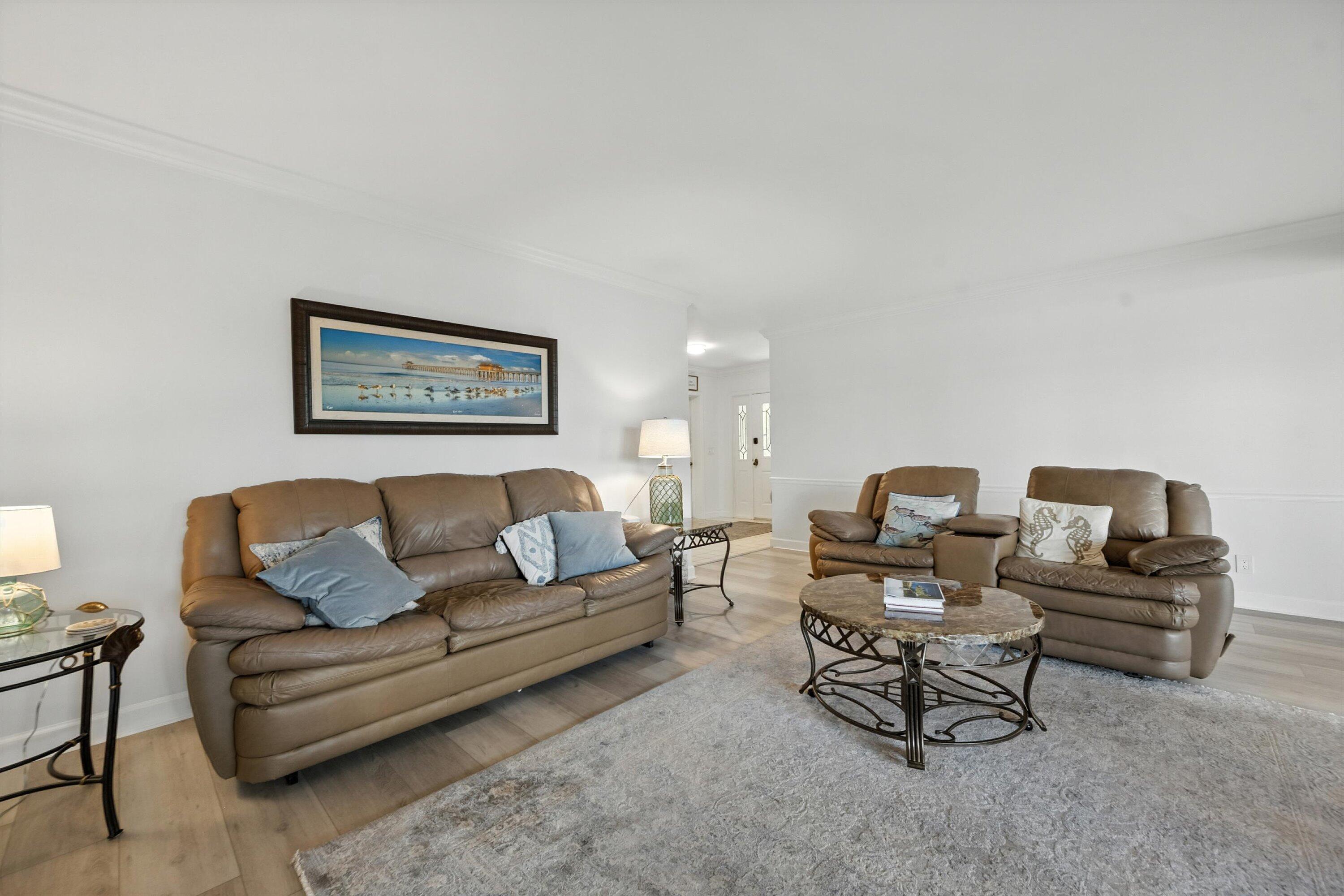 16913 Waterbend Drive, Unit 165 Jupiter, FL 33477 - Photo 7 of 39 a living room with furniture and a couch