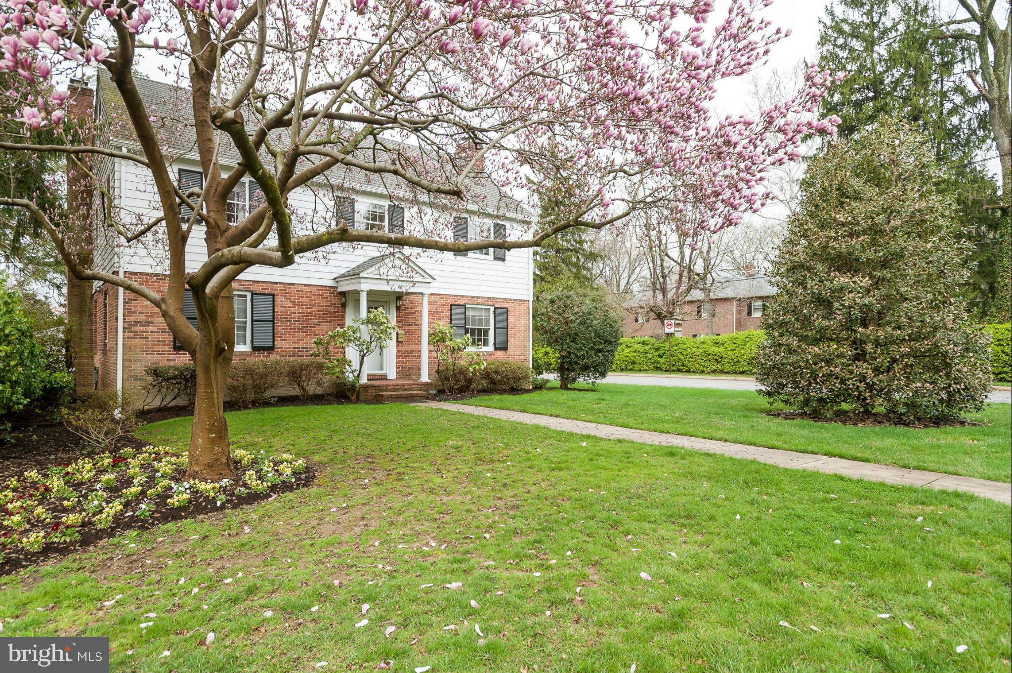5918 Charlesmead Road Baltimore, MD 21212 - Photo 2 of 27 a view of a house with a big yard and large trees