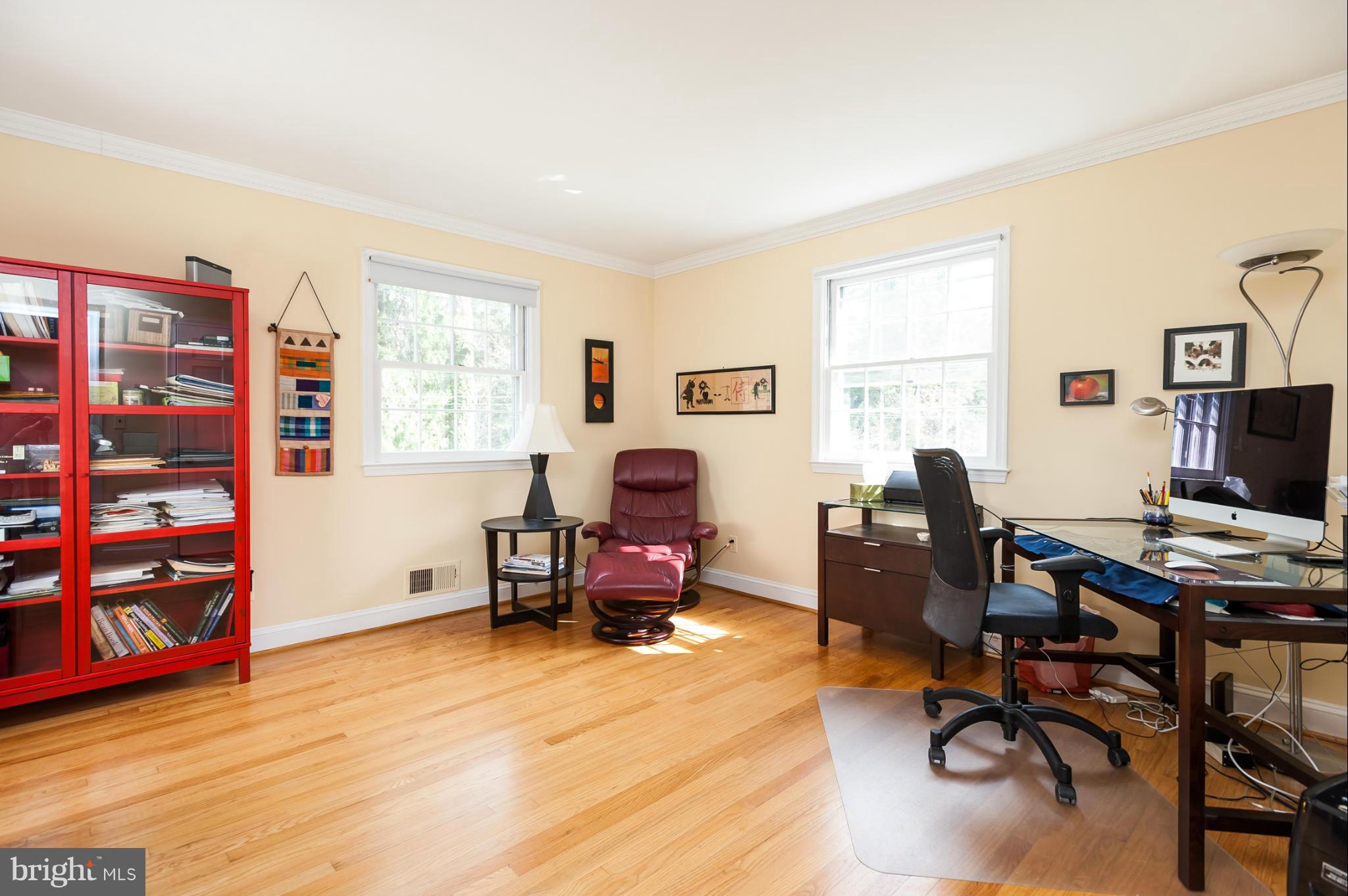 5918 Charlesmead Road Baltimore, MD 21212 - Photo 18 of 27 a workspace with furniture hardwood and a window