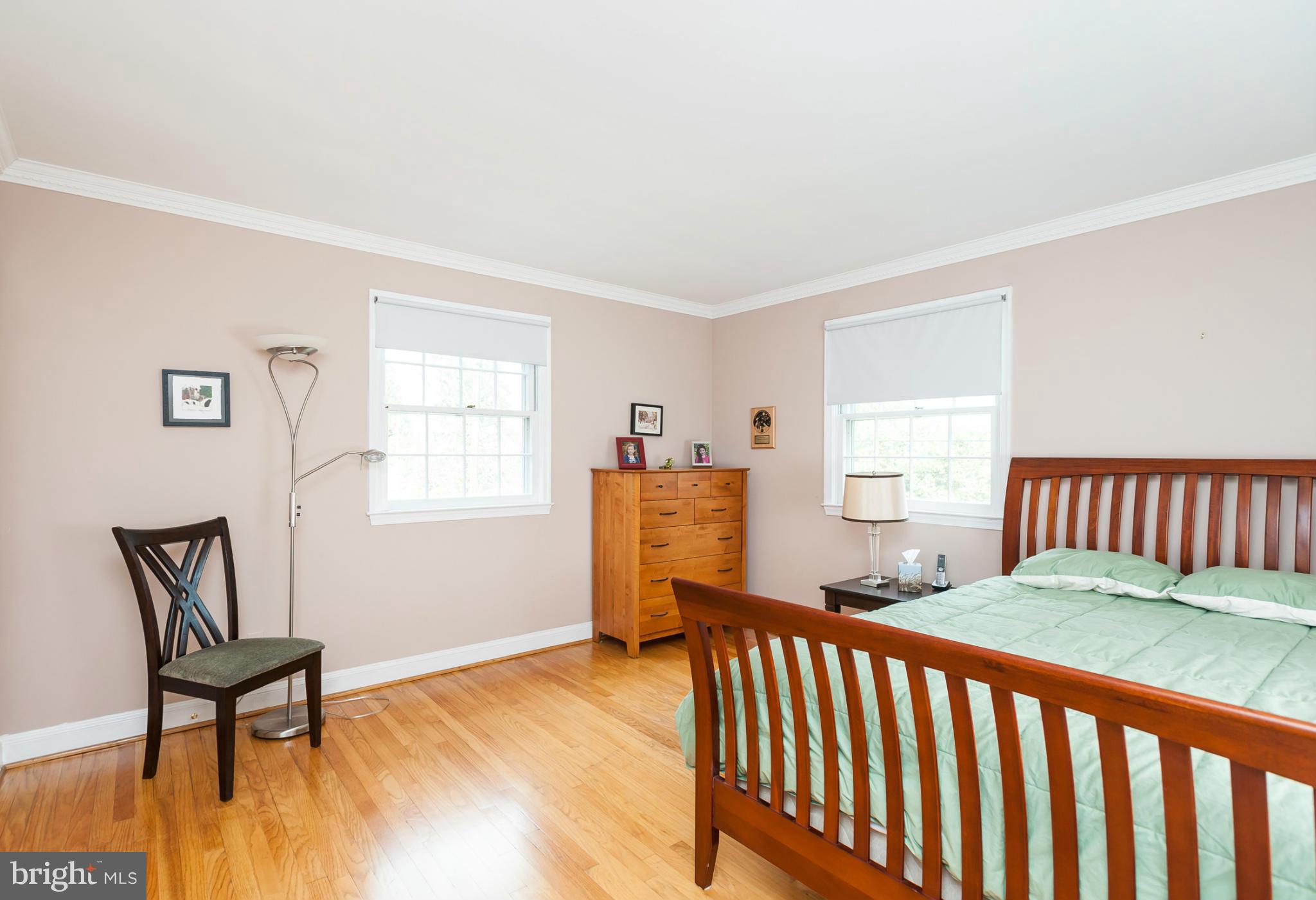 5918 Charlesmead Road Baltimore, MD 21212 - Photo 20 of 27 a bedroom with furniture and a window