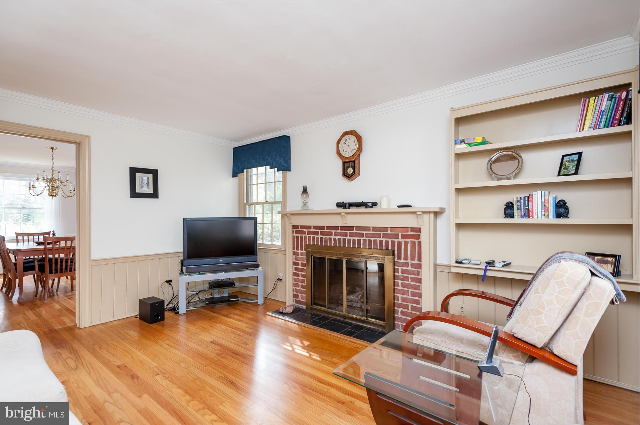 5918 Charlesmead Road Baltimore, MD 21212 - Photo 9 of 27 a living room with furniture fireplace and flat screen tv