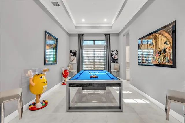 a bathroom with a sink a granite counter and a shower