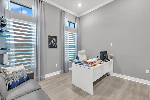 a bathroom with a double vanity sink a mirror and a bathtub