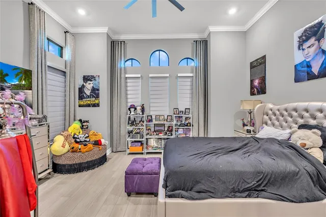 an aerial view of residential houses with yard