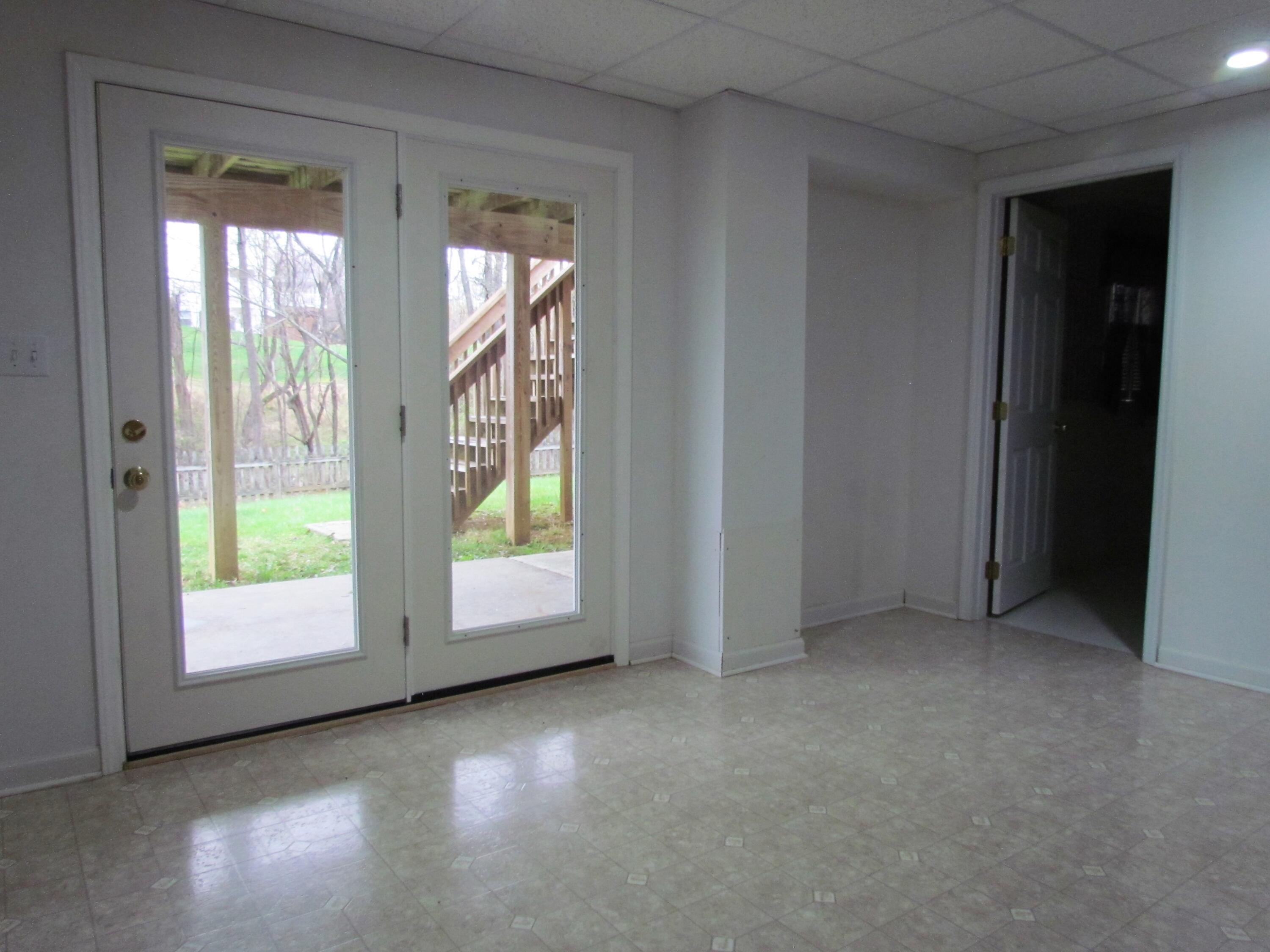 1333 Archway Road Blue Ridge, VA 24064 - Photo 34 of 37 an empty room with windows