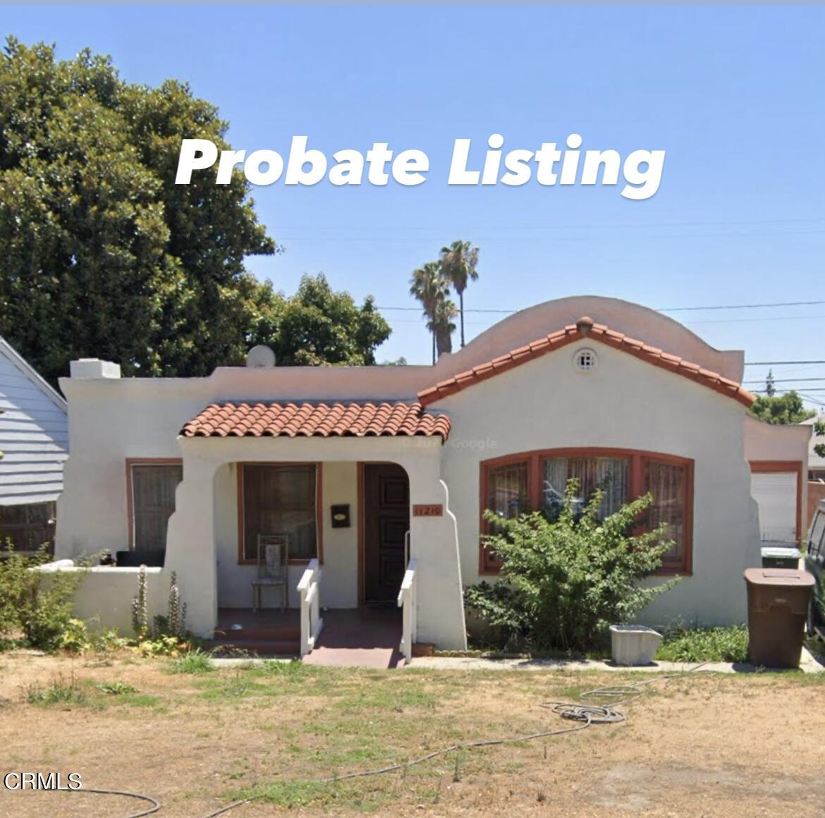 11210 Oak Street El Monte, CA 91731 - Photo 1 of 15 a front view of a house with garden