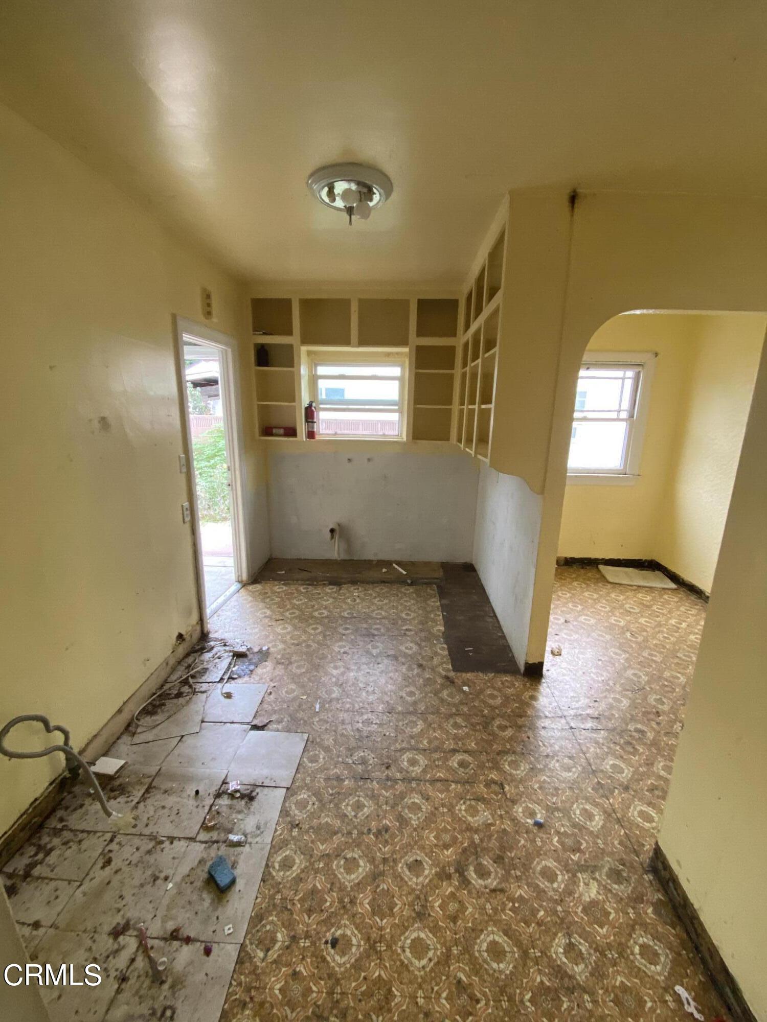 11210 Oak Street El Monte, CA 91731 - Photo 6 of 15 a view of empty room with windows
