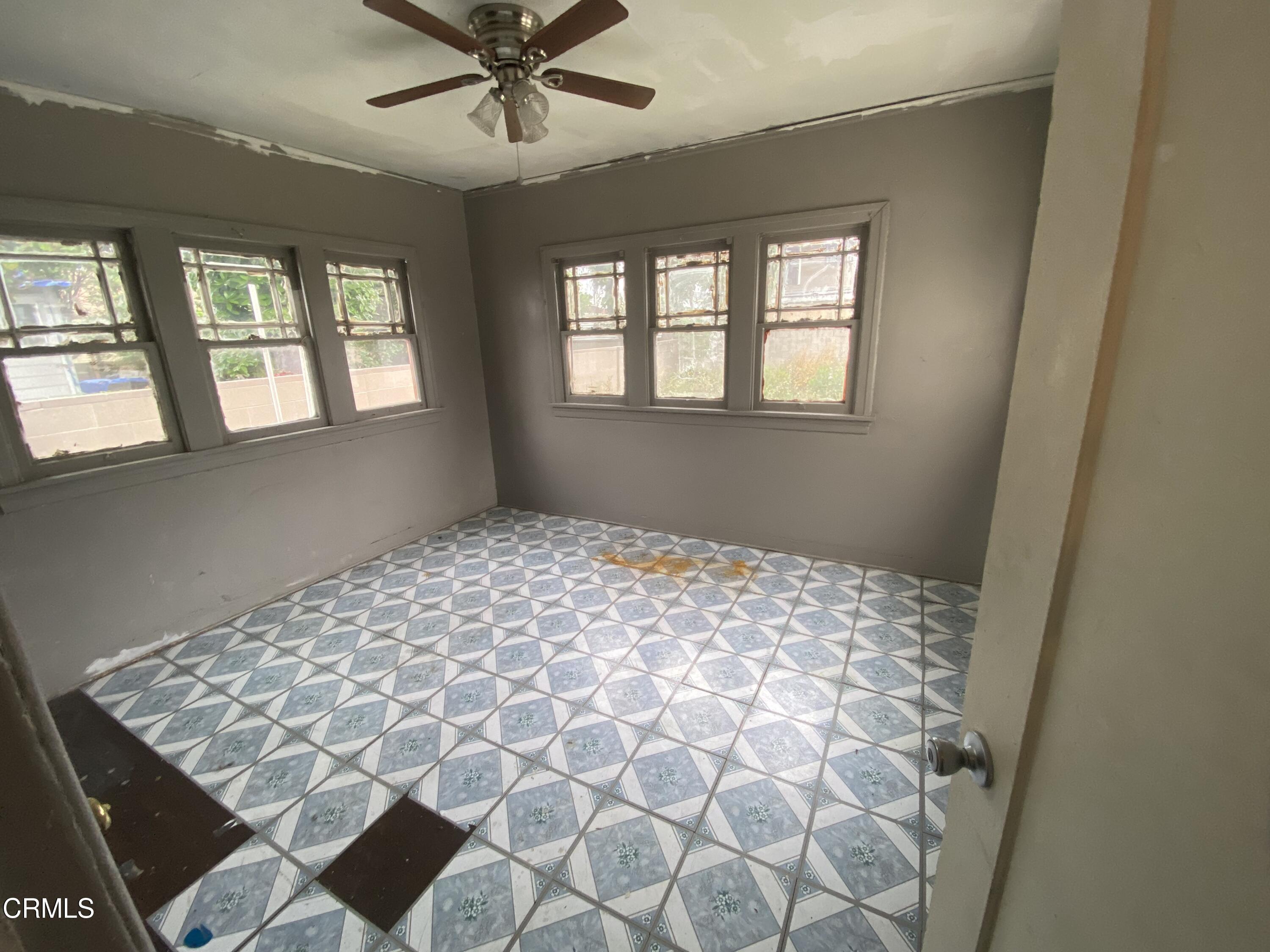 11210 Oak Street El Monte, CA 91731 - Photo 9 of 15 a bedroom with a bed and a window