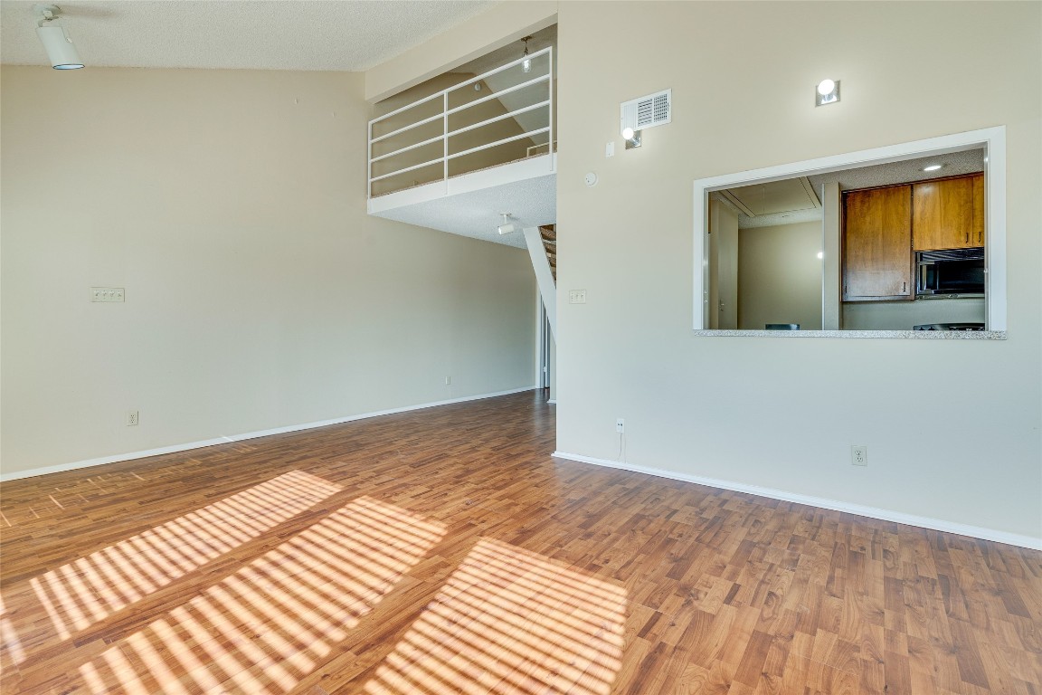 2612 San Pedro Street, Unit 222 Austin, TX 78705 - Photo 15 of 37 a view of a room with wooden floor and a bathroom