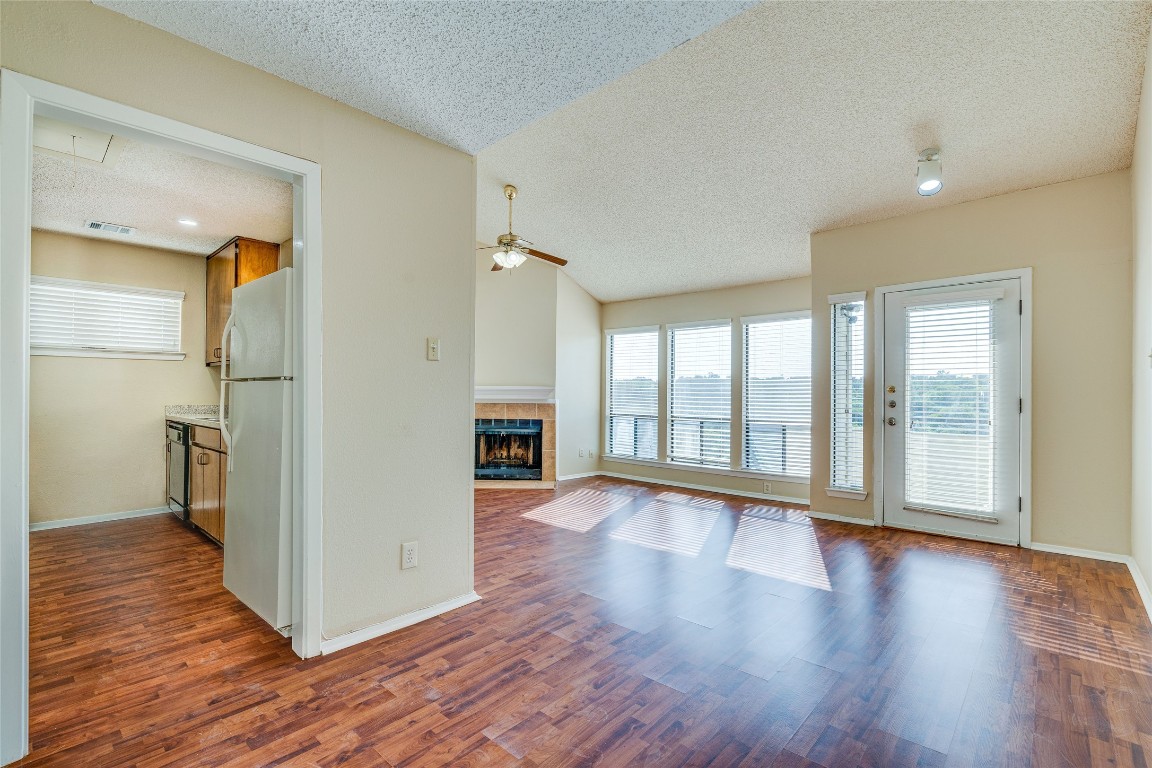 2612 San Pedro Street, Unit 222 Austin, TX 78705 - Photo 21 of 37 a view of an empty room with wooden floor and a window