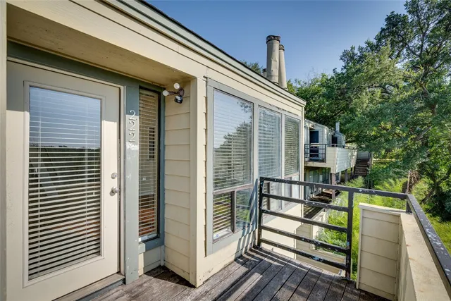 a view of outdoor space with deck and furniture