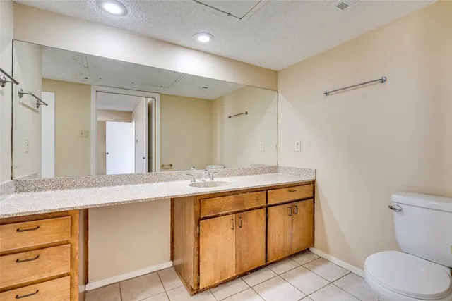 a bathroom with a sink double vanity and a tub