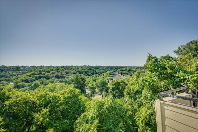 a view of a balcony with skyline