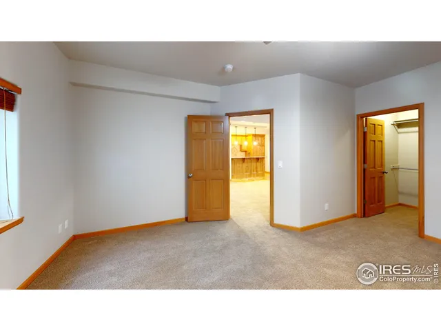 a black and white photo of a living room